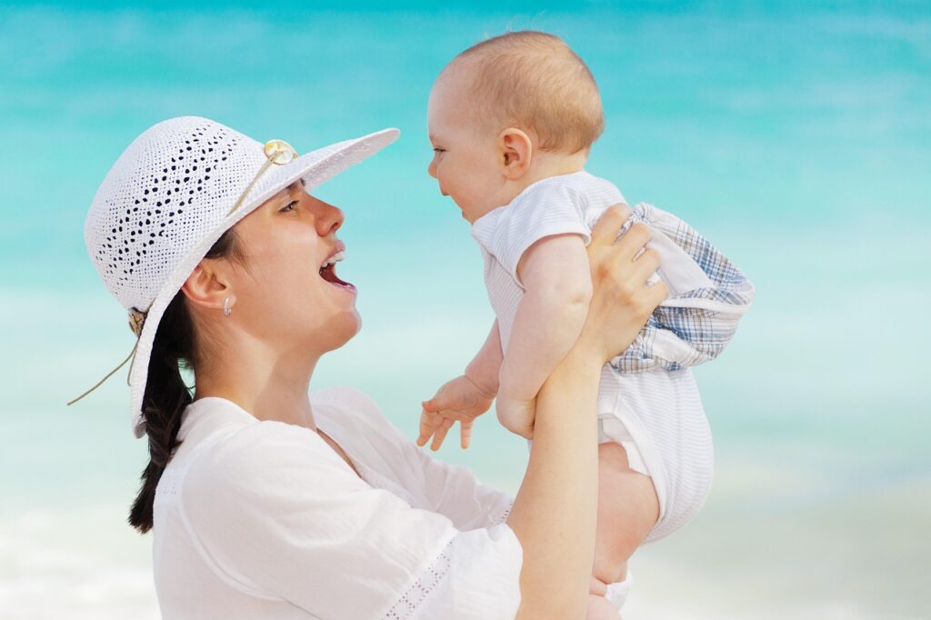 mother, baby, happy, motherhood, toddler, beach, nature, outdoors, smiling, summer, people, sea, woman, child, joy, vacation, mom