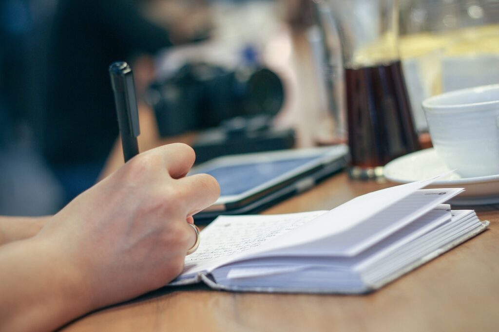 hand, write, pen, notebook, journal, planner, writing, paper, pages, open notebook, notes, desk, person, work, working, writer, taking notes, write, journal, writing, writing, writing, writing, work, work, writer, writer, writer, writer, writer, Here's where most students go wrong: they think reading equals studying. Sorry, but highlighting every other sentence doesn't count as academic learning techniques.