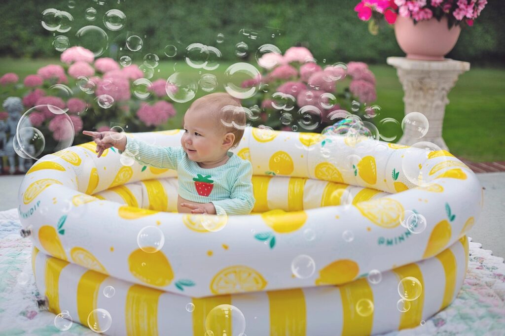 baby, nature, bubbles, pool, summer fun, summer, child plays with bubbles, bubbles in pool, toddler, child