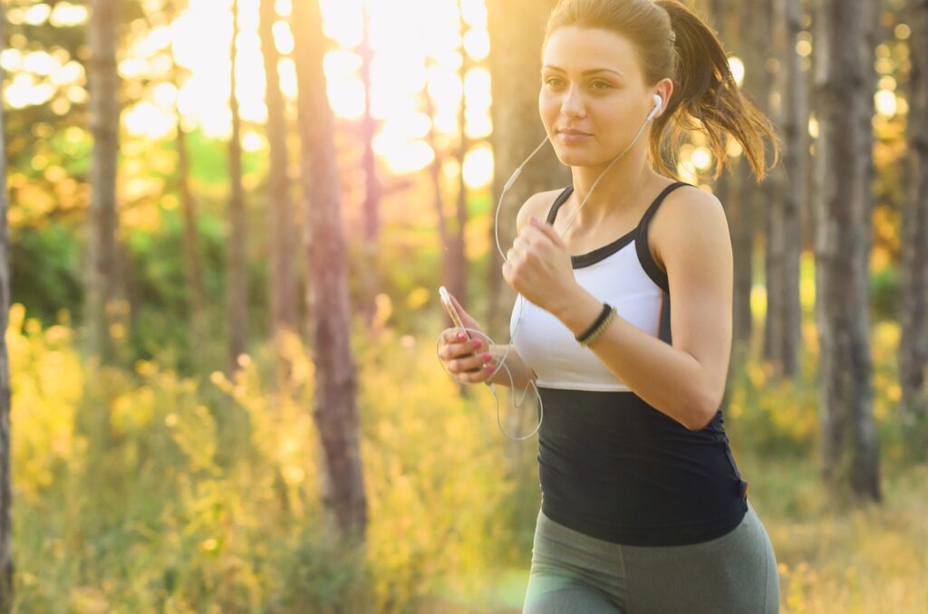woman, jogging, running, exercise, fitness, earphones, music, sound, cellphone, ipod, fit woman, wellness, young woman, motion, active, active lifestyle, jogging, running, running, running, running, exercise, exercise, exercise, exercise, exercise, fitness, fitness, fitness, music, music. Music and Workout Performance: Shocking Science Behind Power 🎵💪